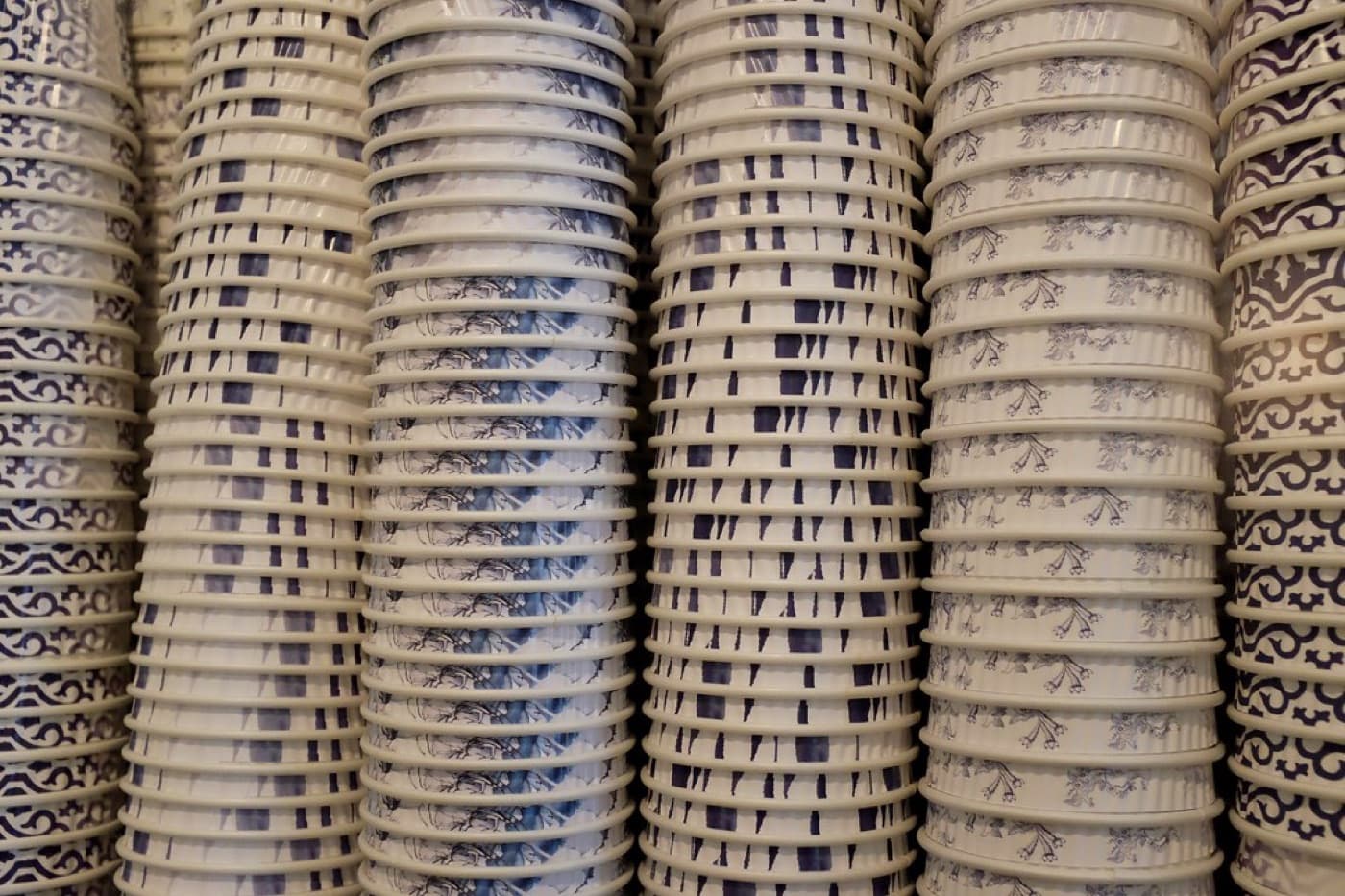 AI-generated representative visual of paper cup fan blanks and coated cupstock pieces