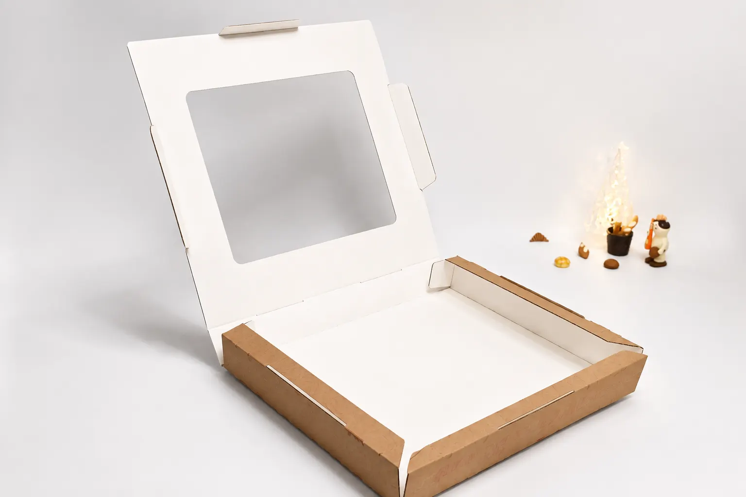 Custom paper boxes displayed open to show folding and assembly structures