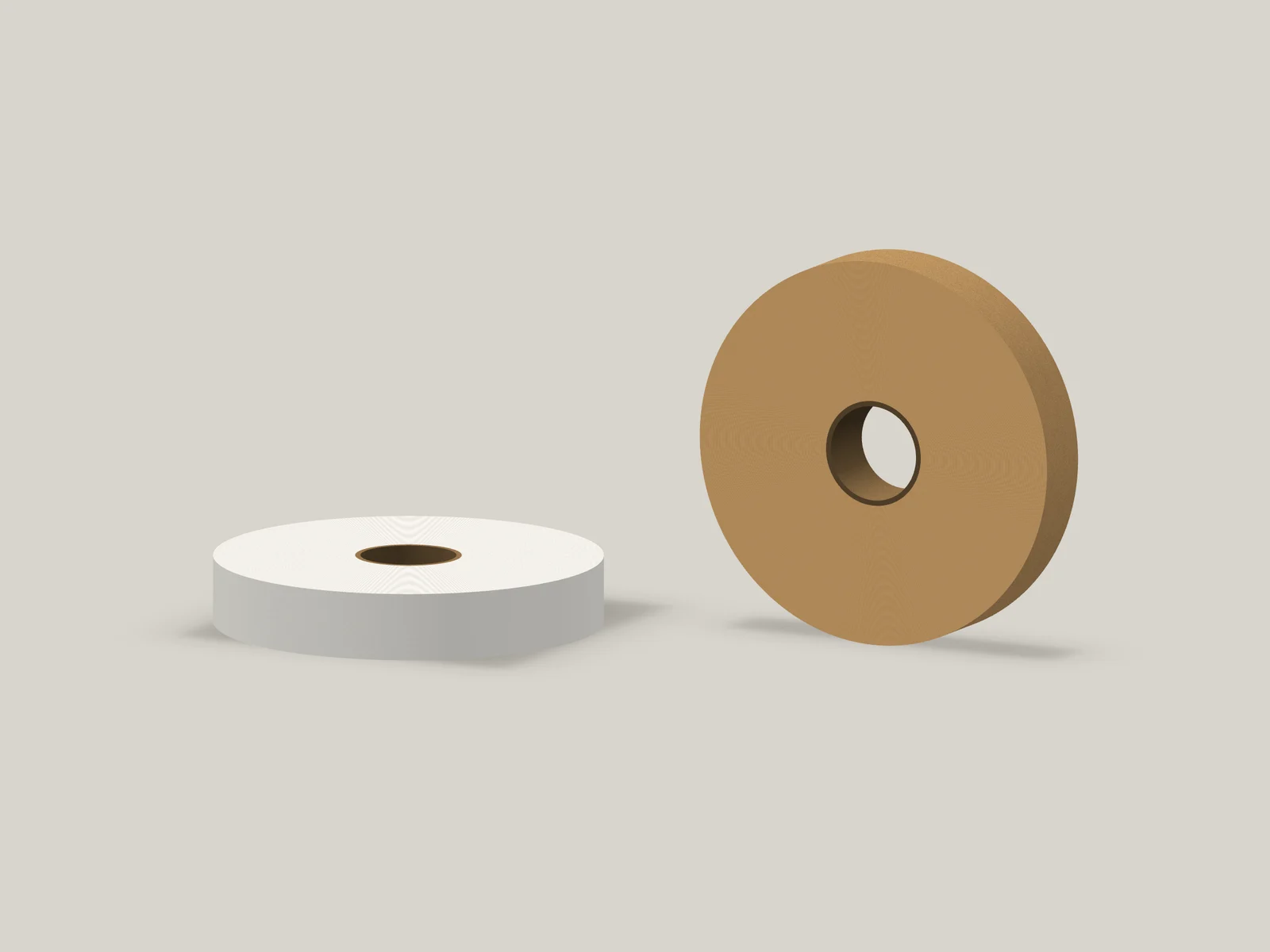 Low-angle view of narrow white and kraft paper bottom rolls