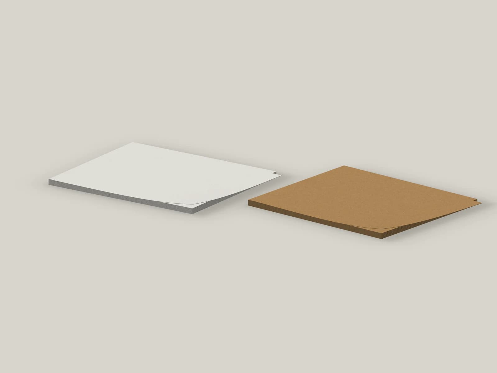 Low-angle view of white and kraft paperboard sheet stacks