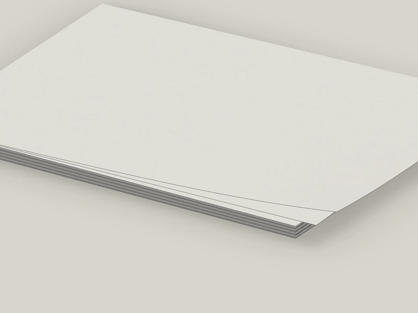 Close-up of stacked white paperboard edges and surface